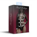 Женская сбруя с цепью и фиксаторами Feral Feelings Harness with Cuffs White